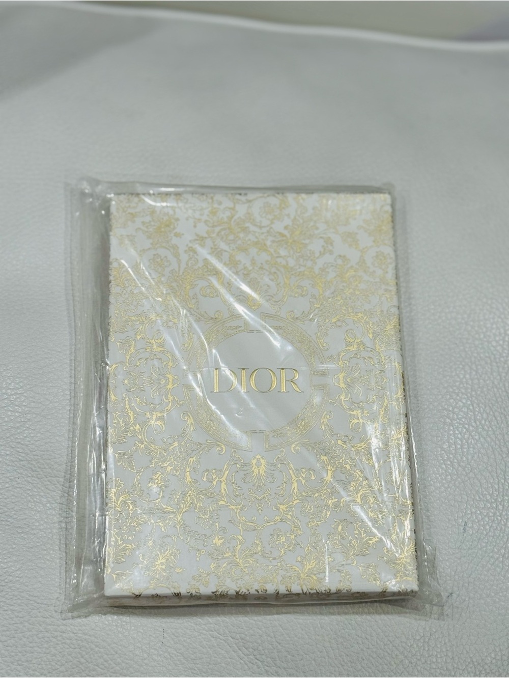 Dior White and Gold Embossed Floral Notebook Phone Case